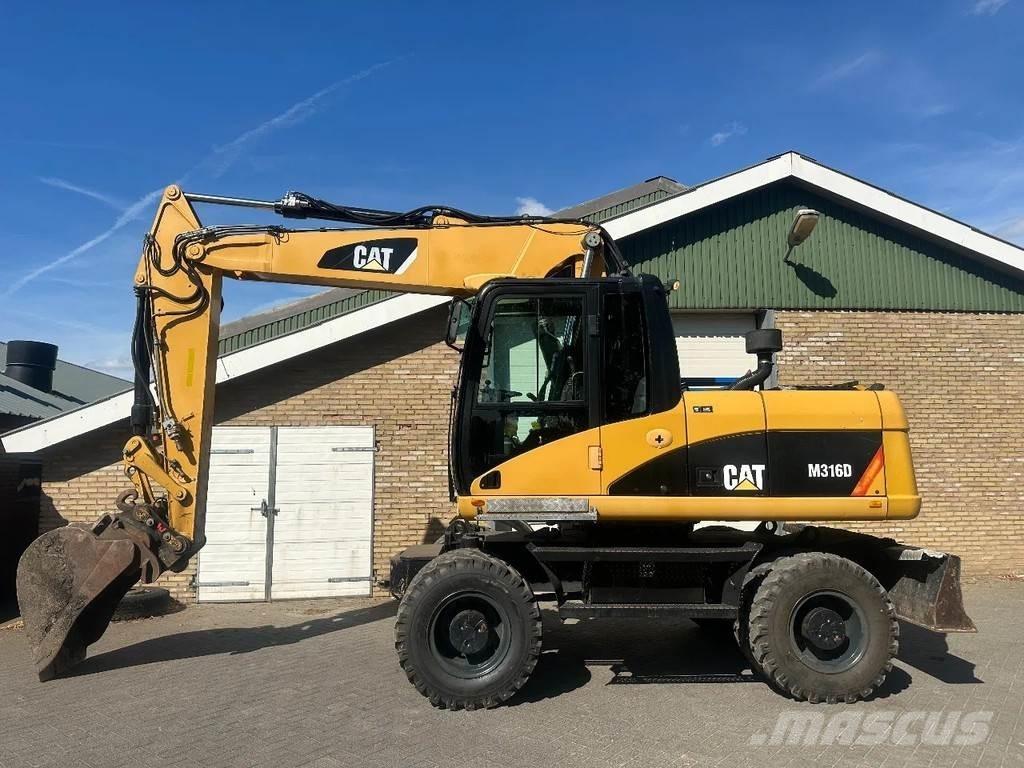 CAT M316D Ekskavatori uz riteņiem