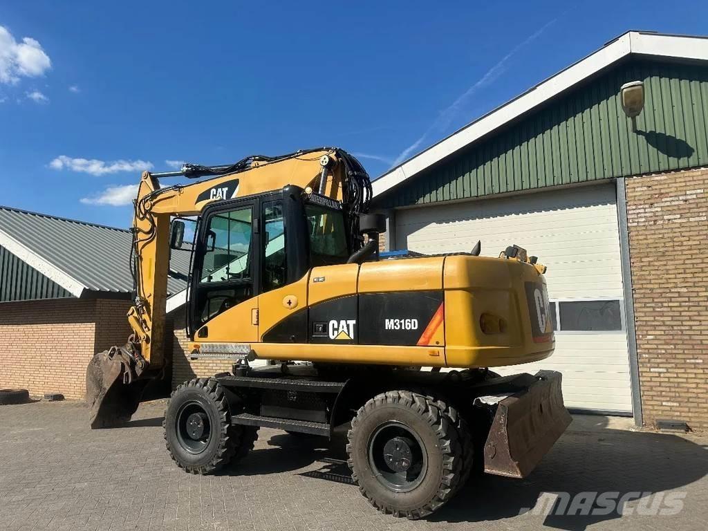 CAT M316D Ekskavatori uz riteņiem