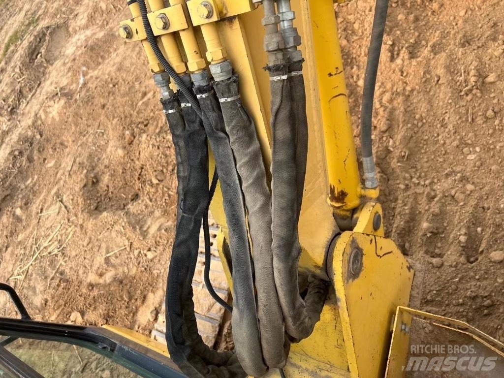 Komatsu PC58 Vidēja lieluma ekskavatori 7 t - 12 t