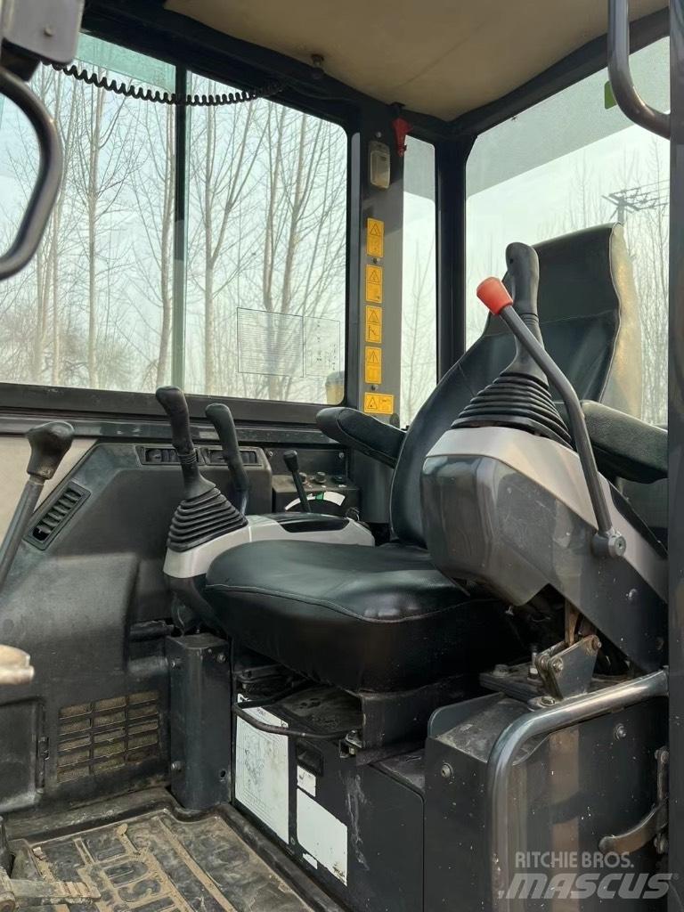 Komatsu PC58 Vidēja lieluma ekskavatori 7 t - 12 t