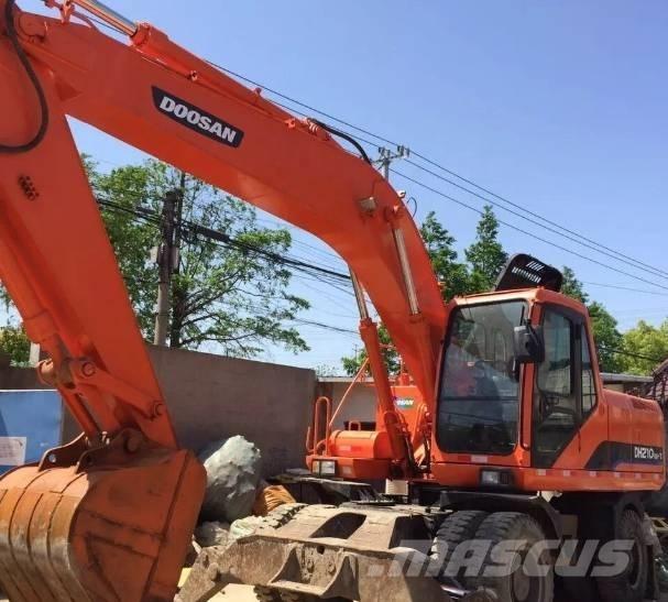 Doosan DH210W\ Ekskavatori uz riteņiem