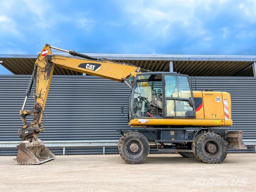 CAT M318F Ekskavatori uz riteņiem