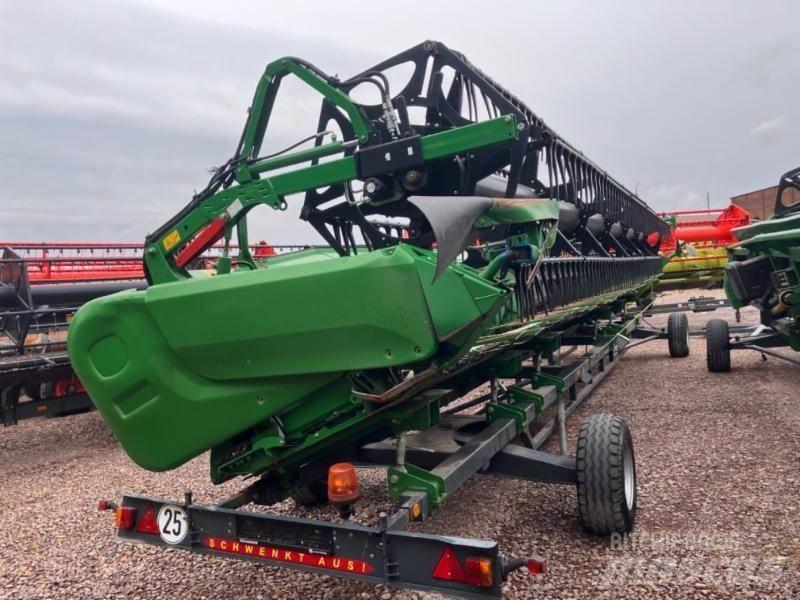 John Deere T 670 Ražas novākšanas kombaini