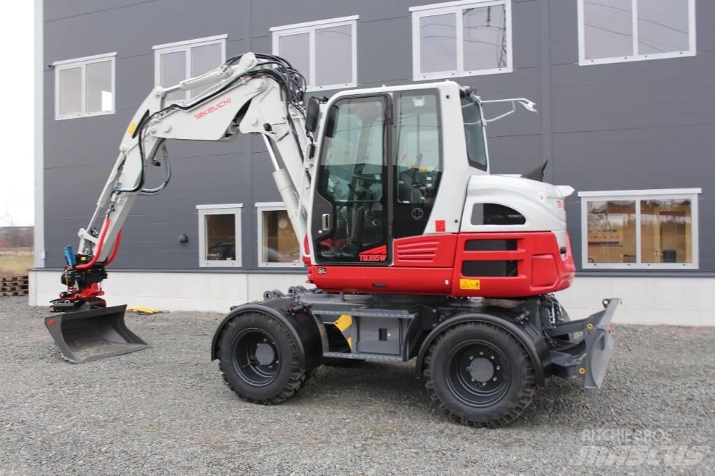 Takeuchi TB395W Ekskavatori uz riteņiem