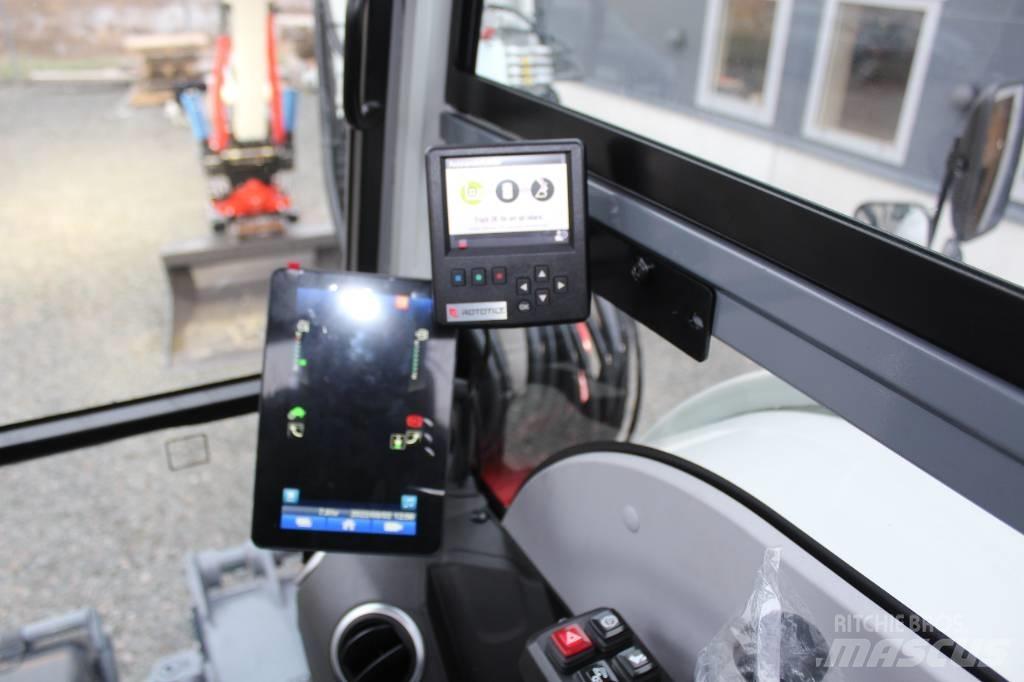 Takeuchi TB395W Ekskavatori uz riteņiem