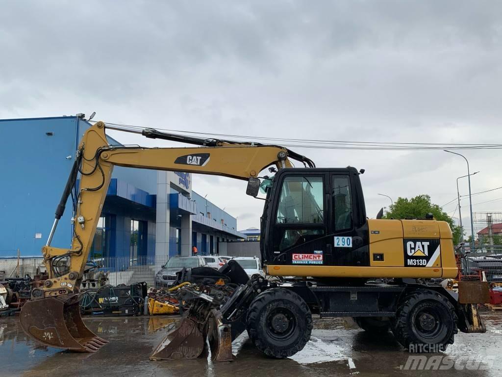 CAT M 313 D Ekskavatori uz riteņiem