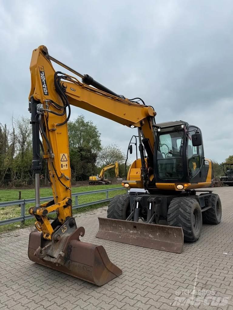 JCB JS 145W Ekskavatori uz riteņiem