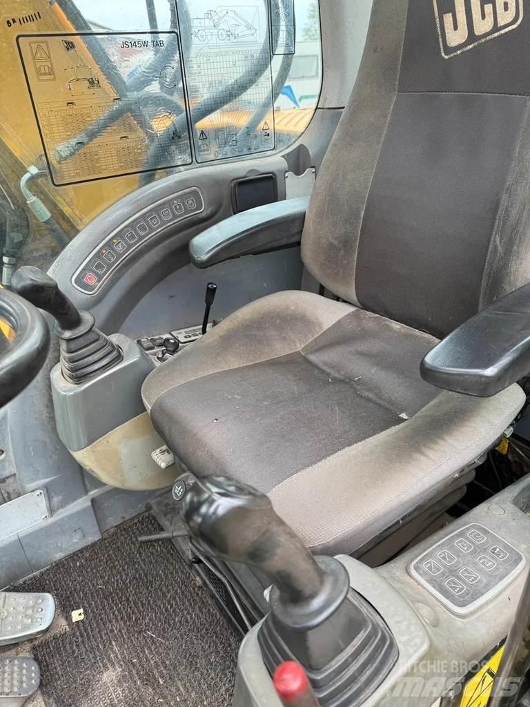 JCB JS 145W Ekskavatori uz riteņiem
