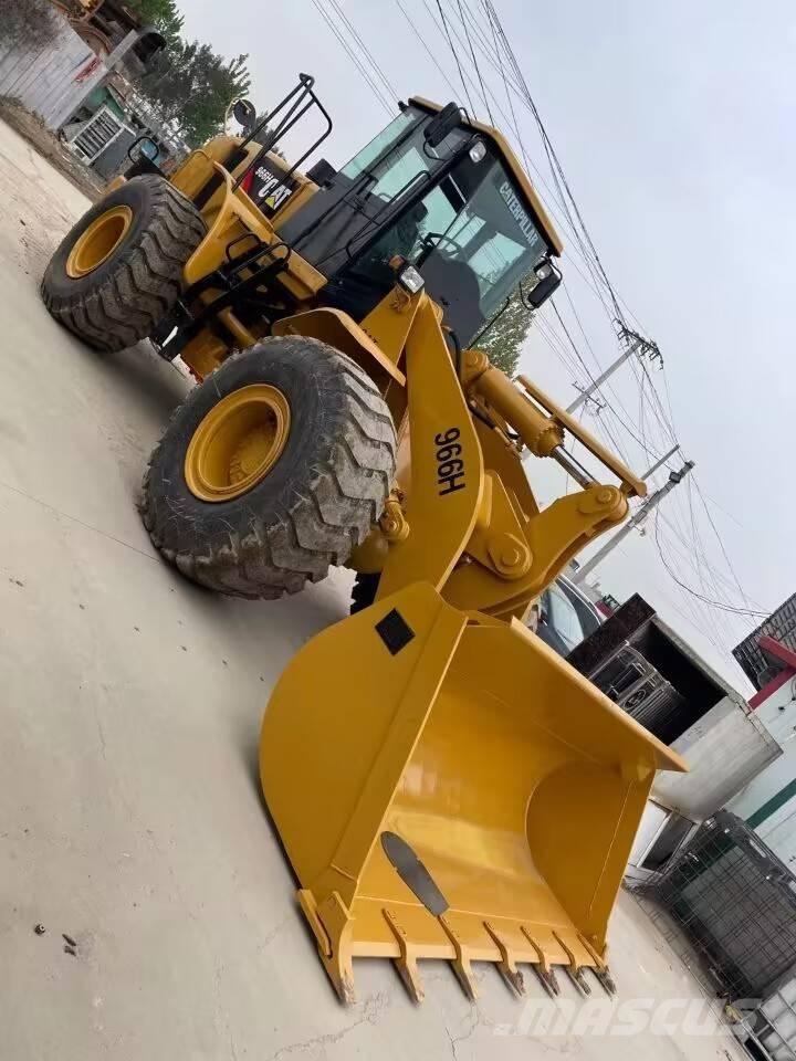 CAT 966 H St VZO Iekrāvēji uz riteņiem
