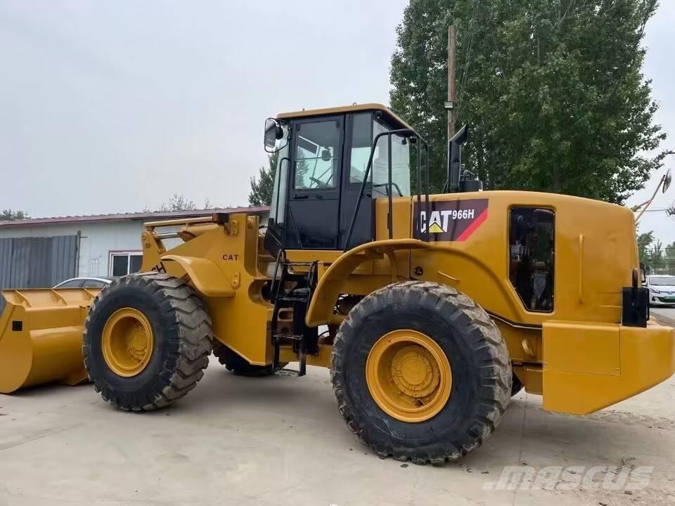 CAT 966 H St VZO Iekrāvēji uz riteņiem