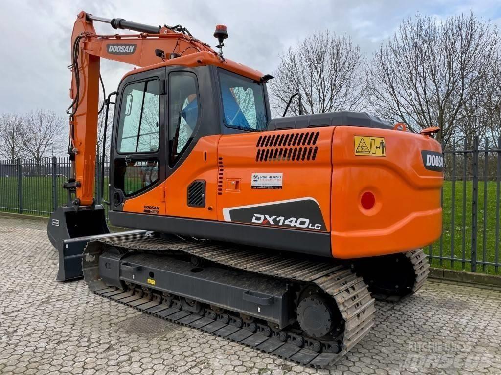 Doosan dx140w Ekskavatori uz riteņiem
