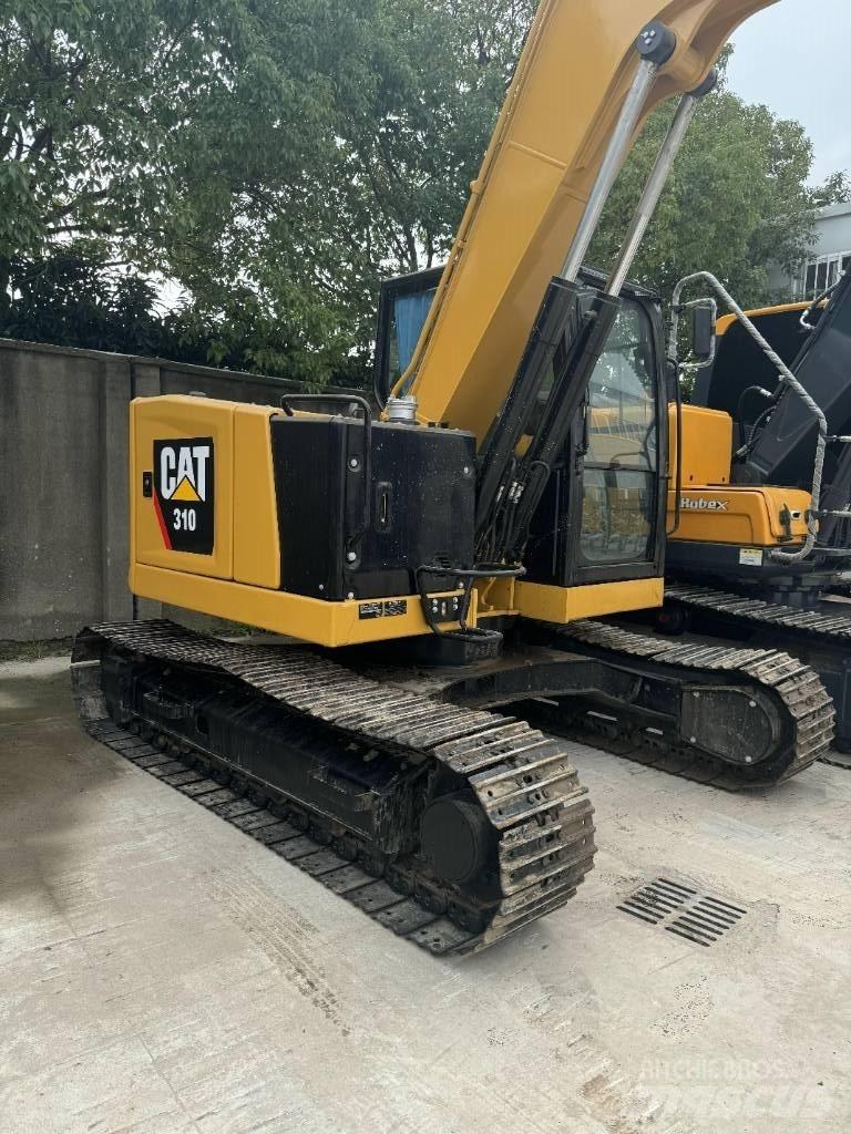 CAT 310 Vienvalča grunts veltņi