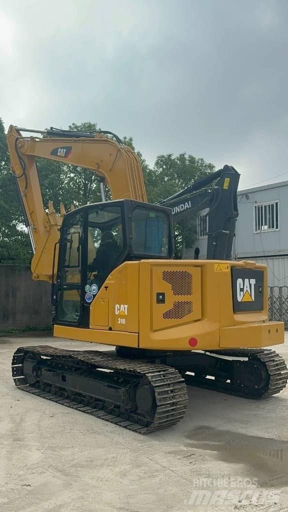 CAT 310 Vienvalča grunts veltņi