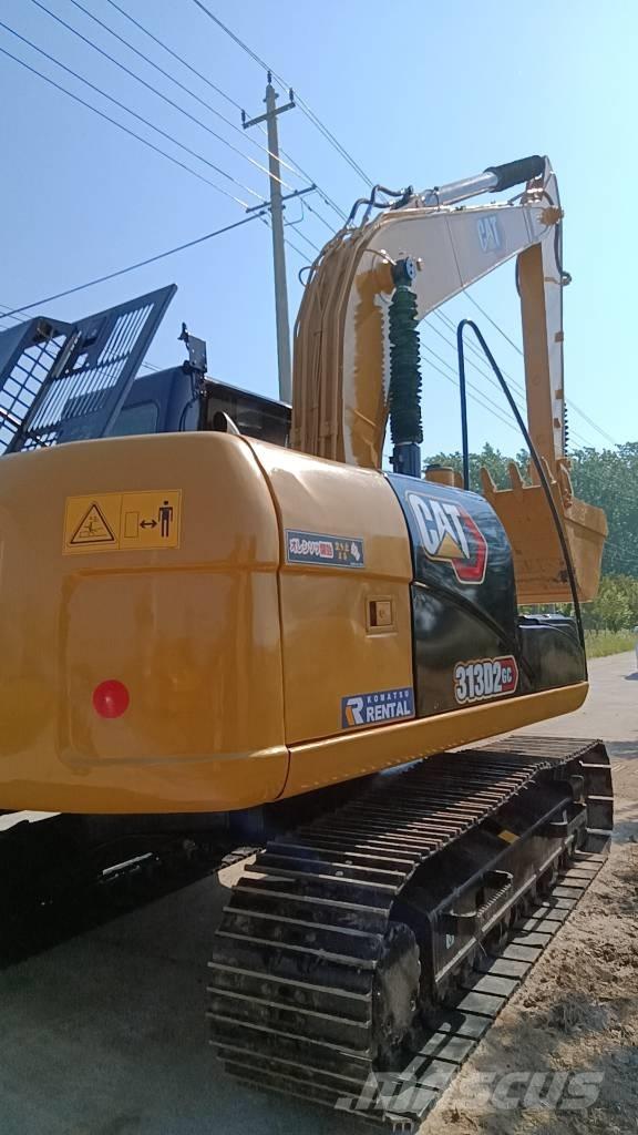 CAT 313 D Ekskavatori uz riteņiem