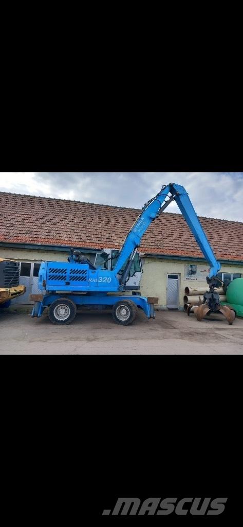 Fuchs MHL 320 Ekskavatori uz riteņiem