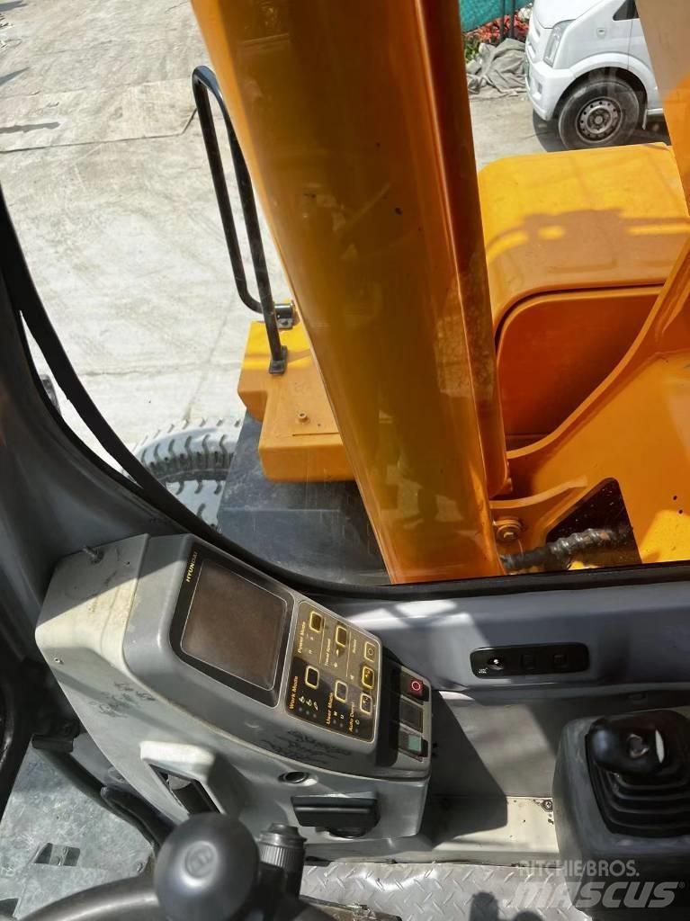 Hyundai 210W-7 Ekskavatori uz riteņiem