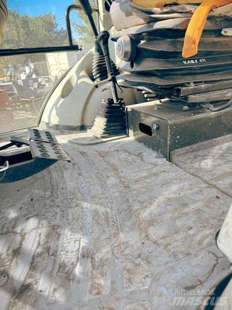 Komatsu WB 140-2N Ekskavatori-iekrāvēji