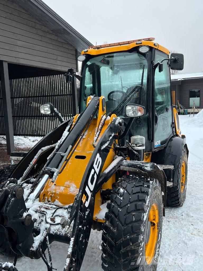 JCB 409 Iekrāvēji uz riteņiem