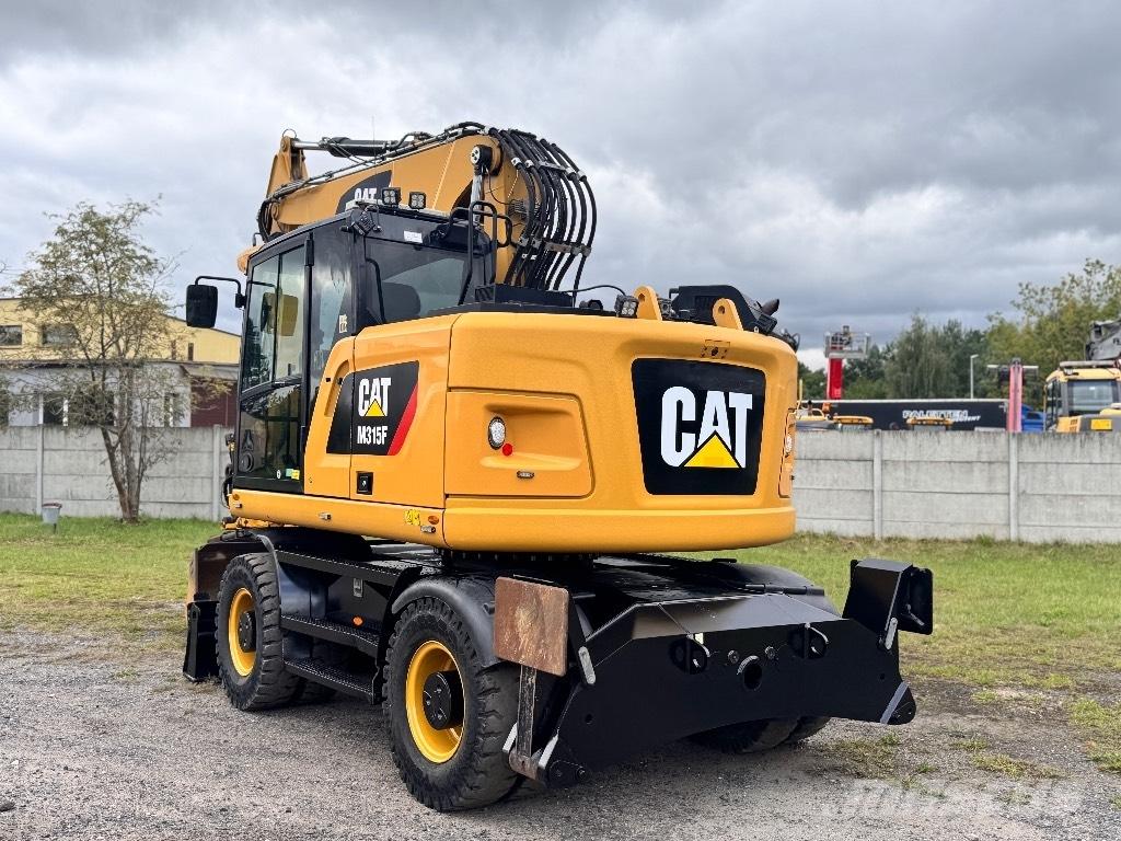 CAT M315F Ekskavatori uz riteņiem