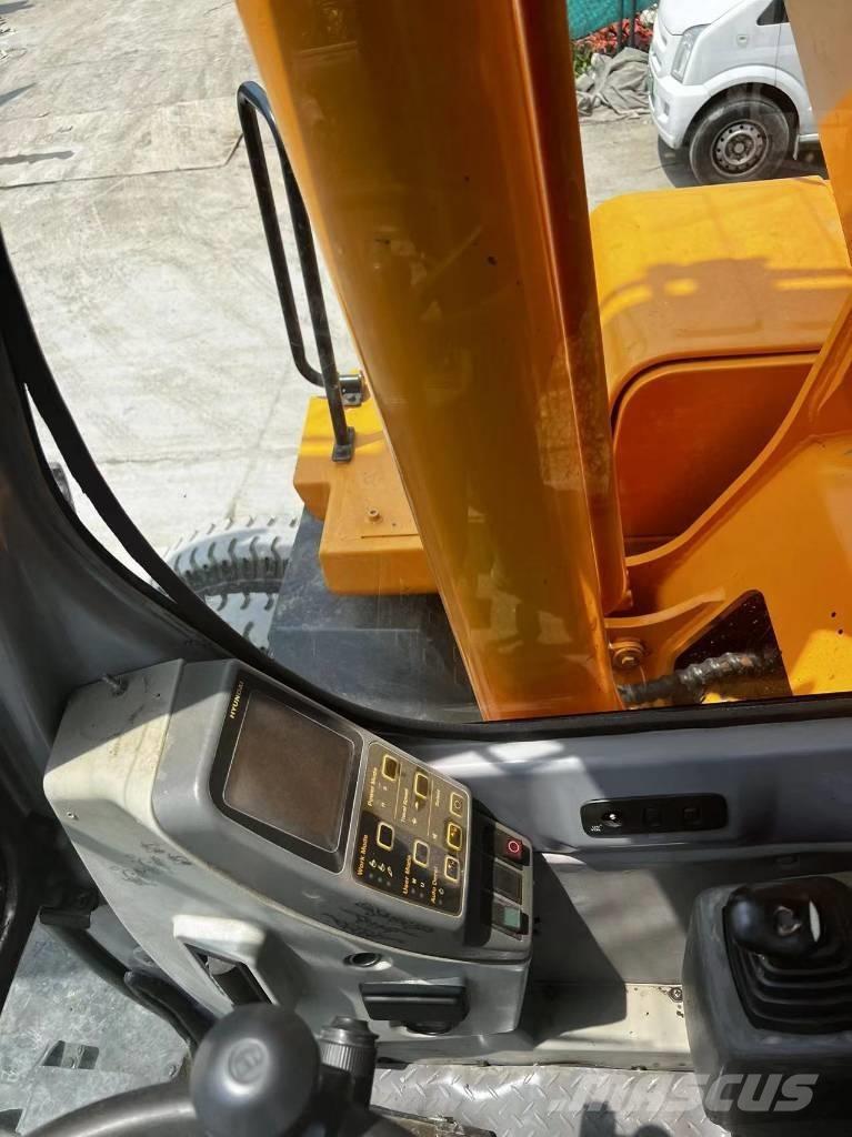 Hyundai 210W-7 Ekskavatori uz riteņiem