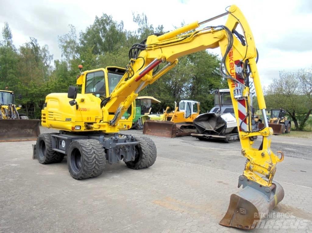 Takeuchi TB 295 W-2 Ekskavatori uz riteņiem