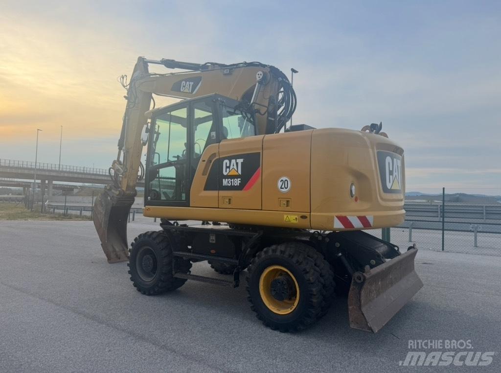 CAT M 318 F Ekskavatori uz riteņiem