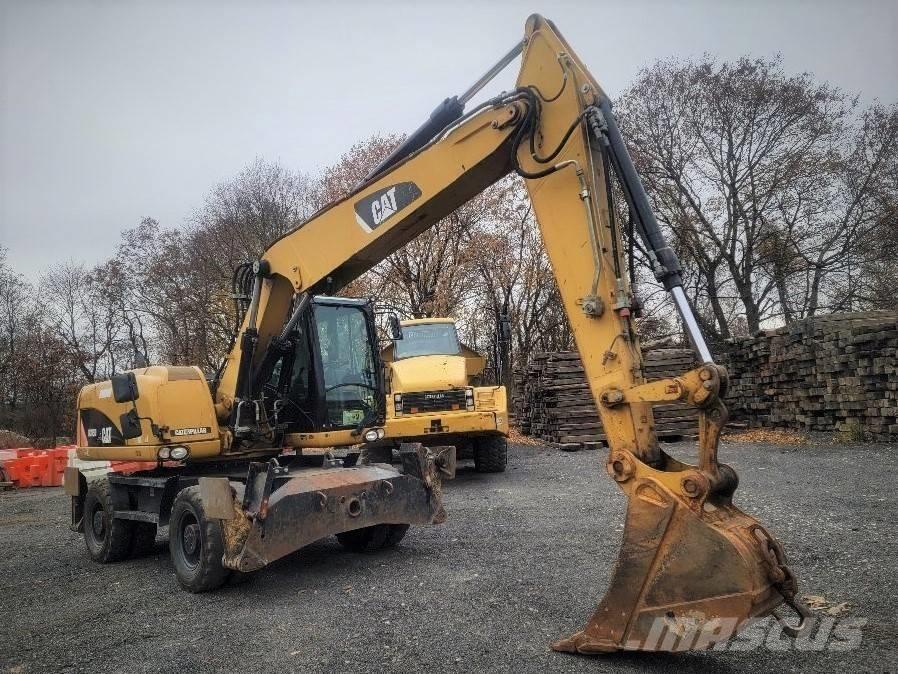 CAT M 315 D Ekskavatori uz riteņiem