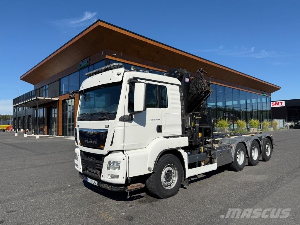 MAN Crane + hook lift Smagās mašīnas ar celtni