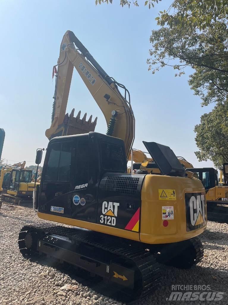 CAT 312 Vidēja lieluma ekskavatori 7 t - 12 t