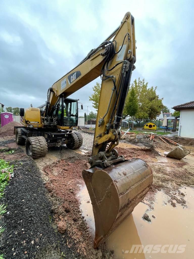 CAT 316 D Ekskavatori uz riteņiem