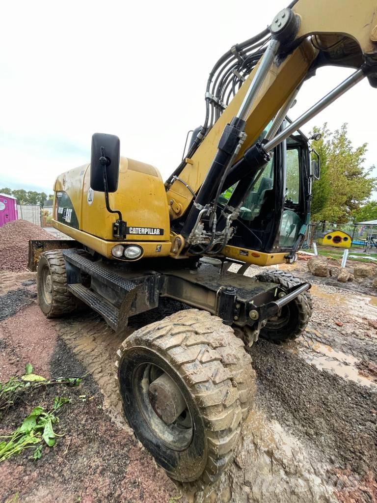 CAT 316 D Ekskavatori uz riteņiem
