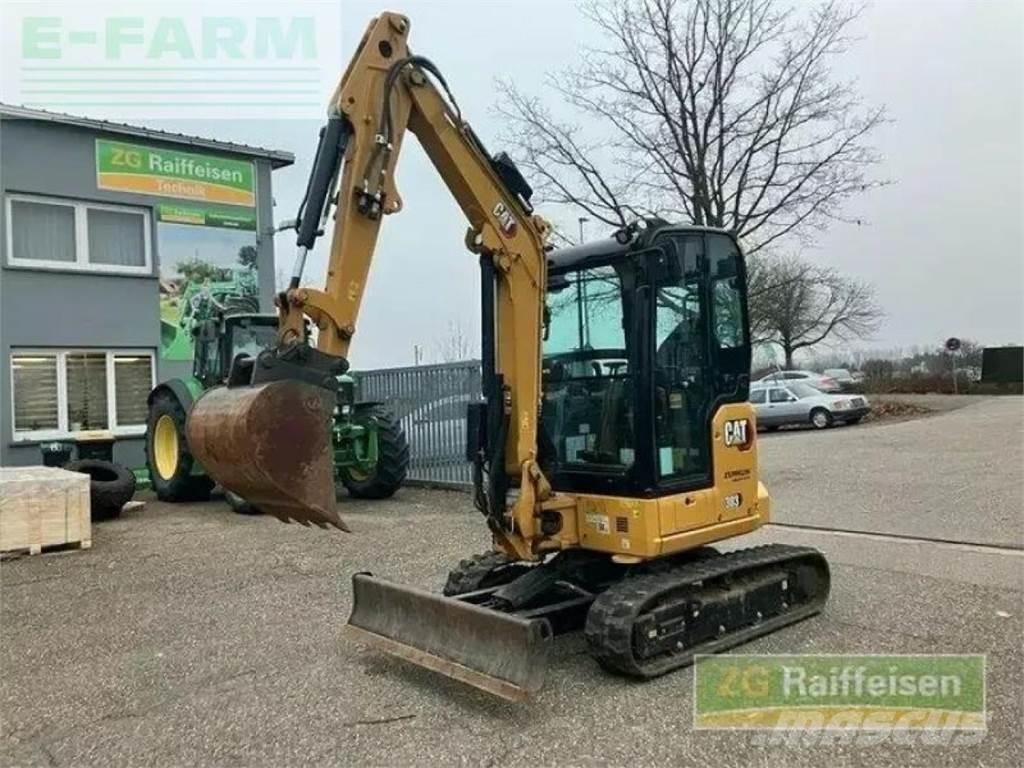 CAT 303 minibagger Ekskavatori uz riteņiem