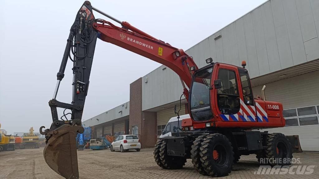 Fiat-Hitachi EX135W Ekskavatori uz riteņiem