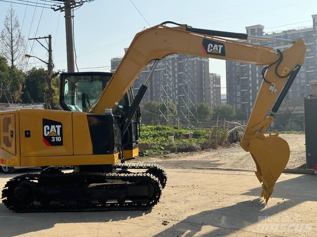 CAT 310 Kāpurķēžu ekskavatori
