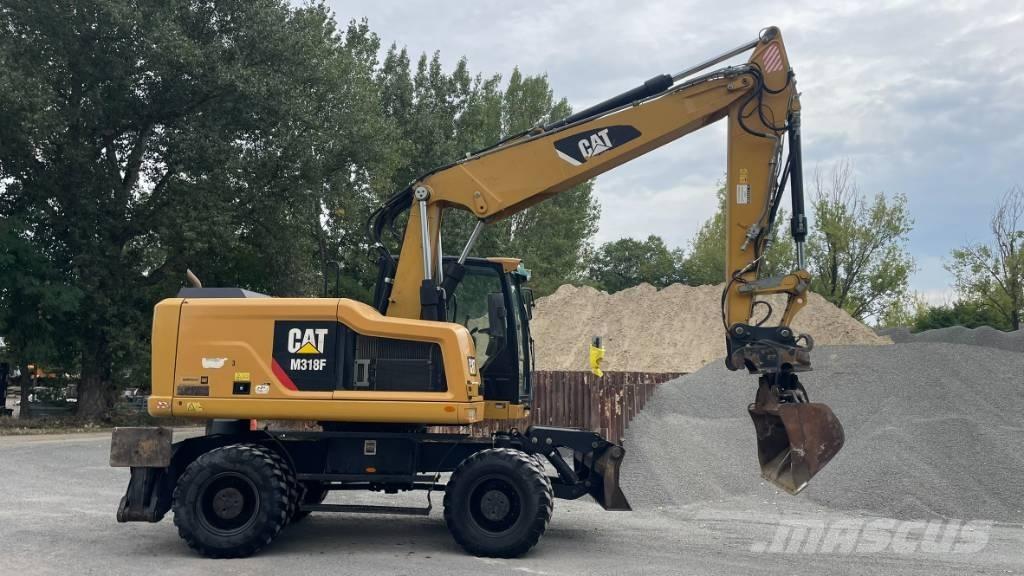 CAT M 318 F Ekskavatori-iekrāvēji