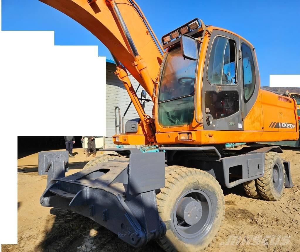 Doosan DX 210 W Ekskavatori uz riteņiem