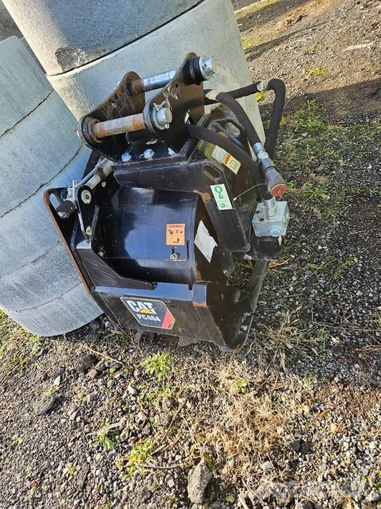 CAT PC 404 Šļūces