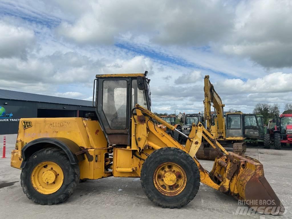 JCB 410 Iekrāvēji uz riteņiem