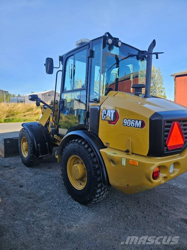 CAT 906 Iekrāvēji uz riteņiem