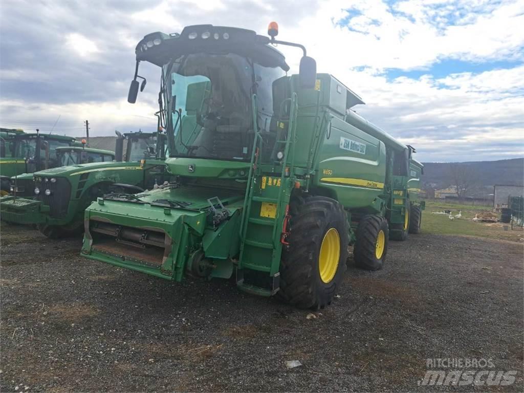 John Deere W650 Ražas novākšanas kombaini