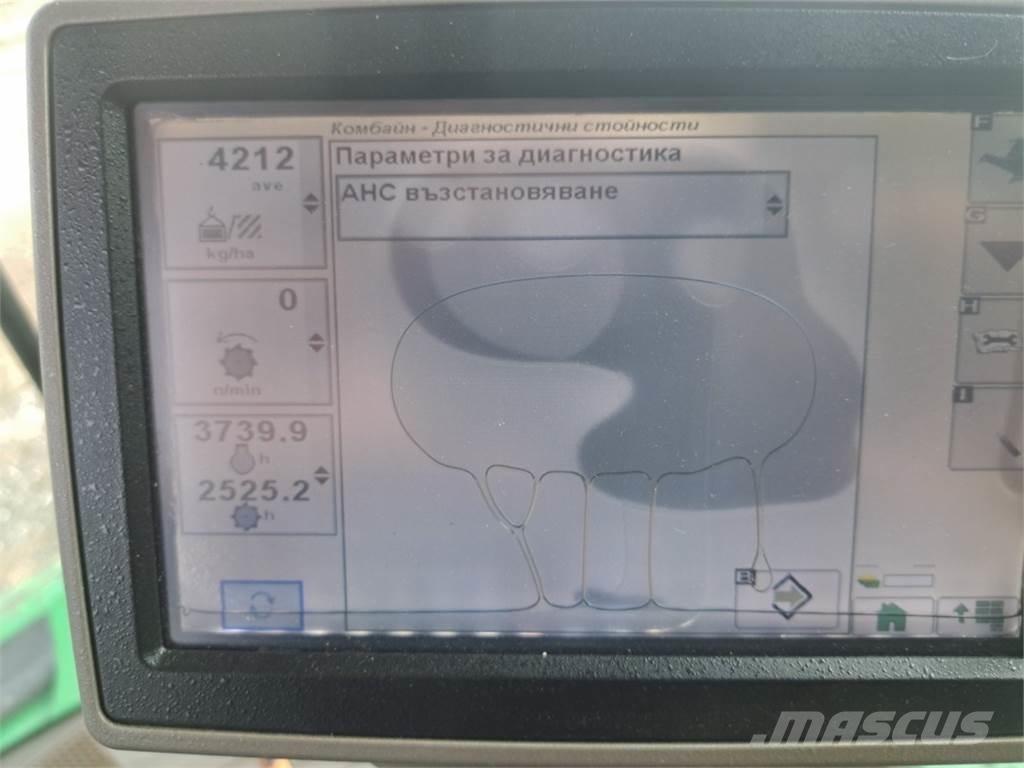 John Deere W650 Ražas novākšanas kombaini
