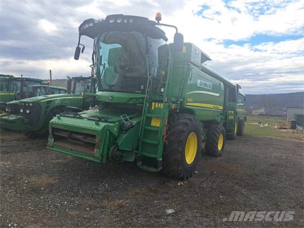 John Deere W650 Ražas novākšanas kombaini