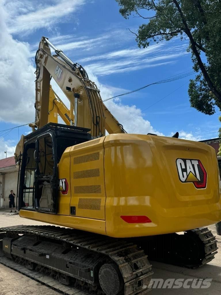 CAT CAT323 Vidēja lieluma ekskavatori 7 t - 12 t