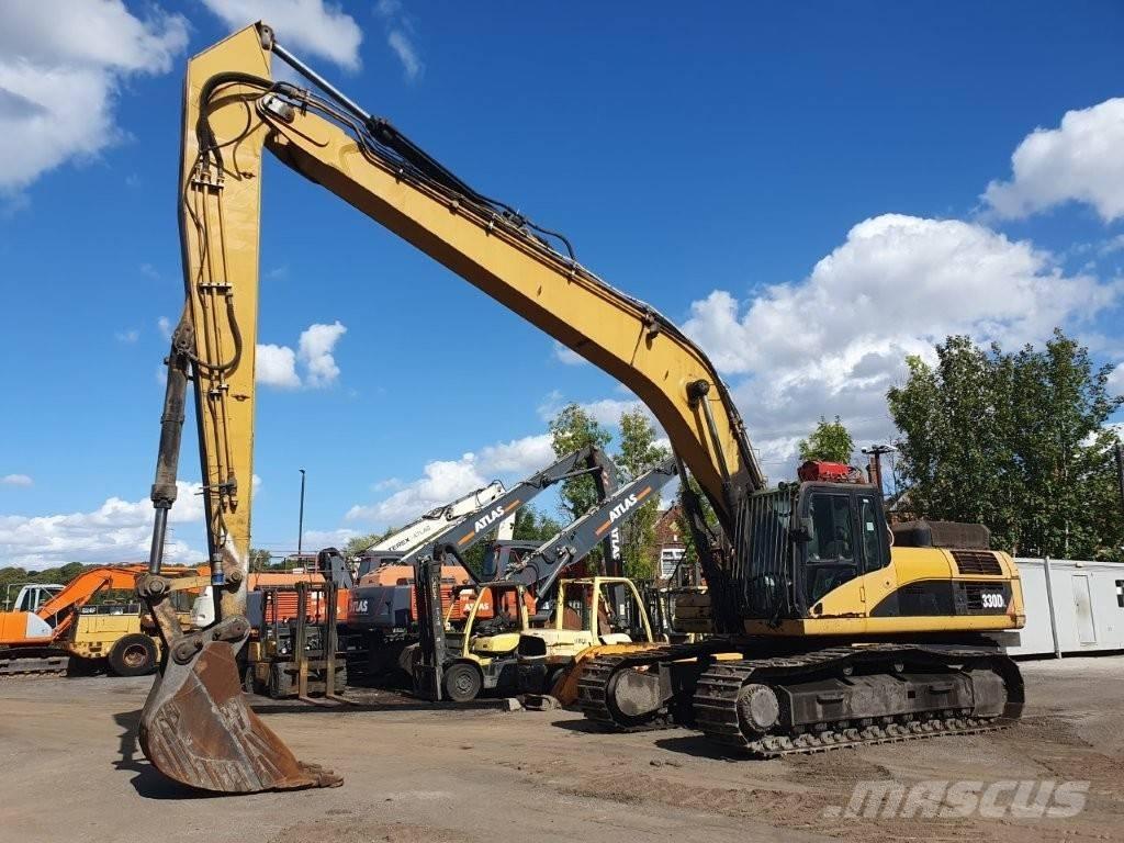 CAT 330 D L Ekskavatori tālās sniedzamības darbiem