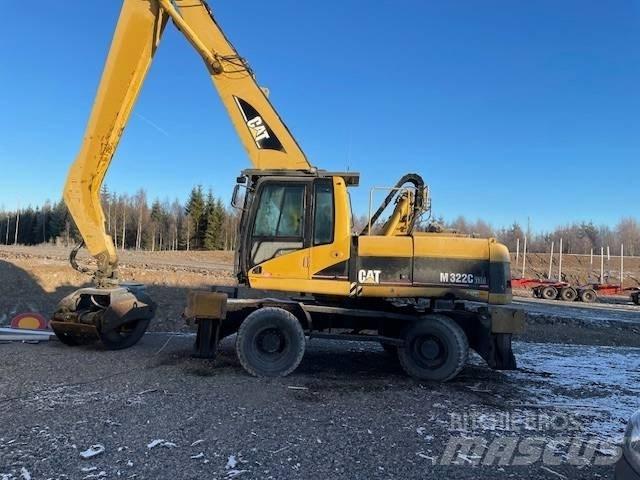 CAT M 322 C MH Ekskavatori uz riteņiem