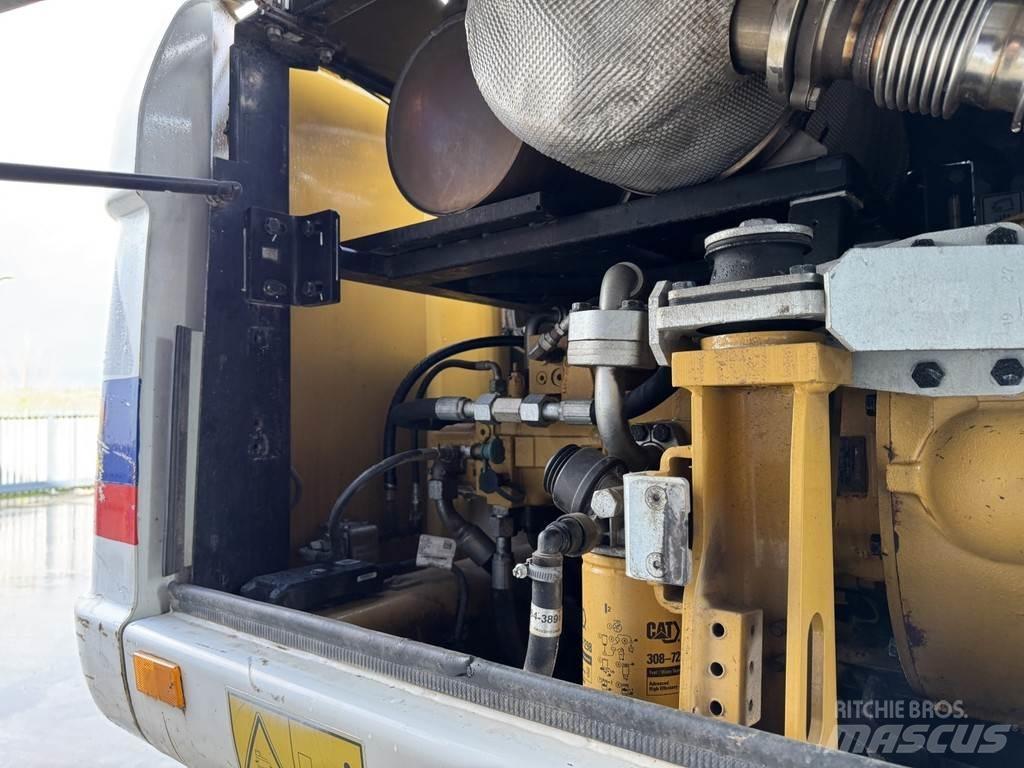 CAT M315D Ekskavatori uz riteņiem