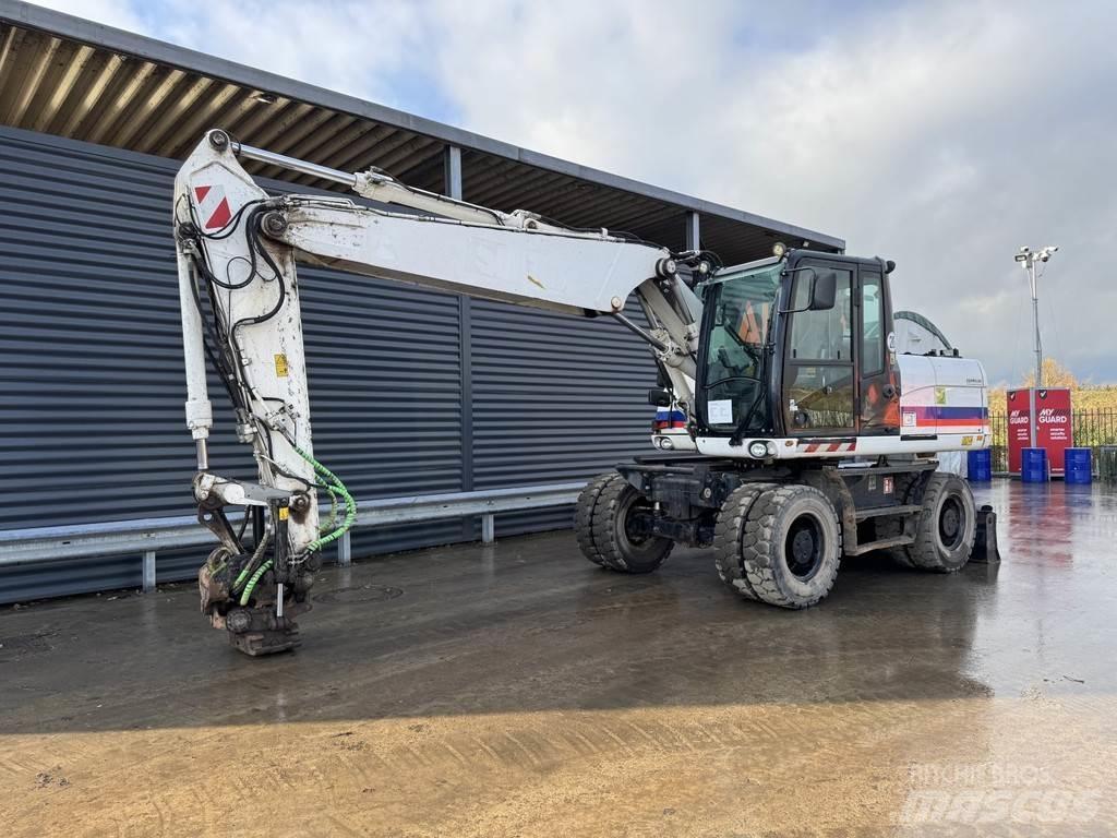 CAT M315D Ekskavatori uz riteņiem