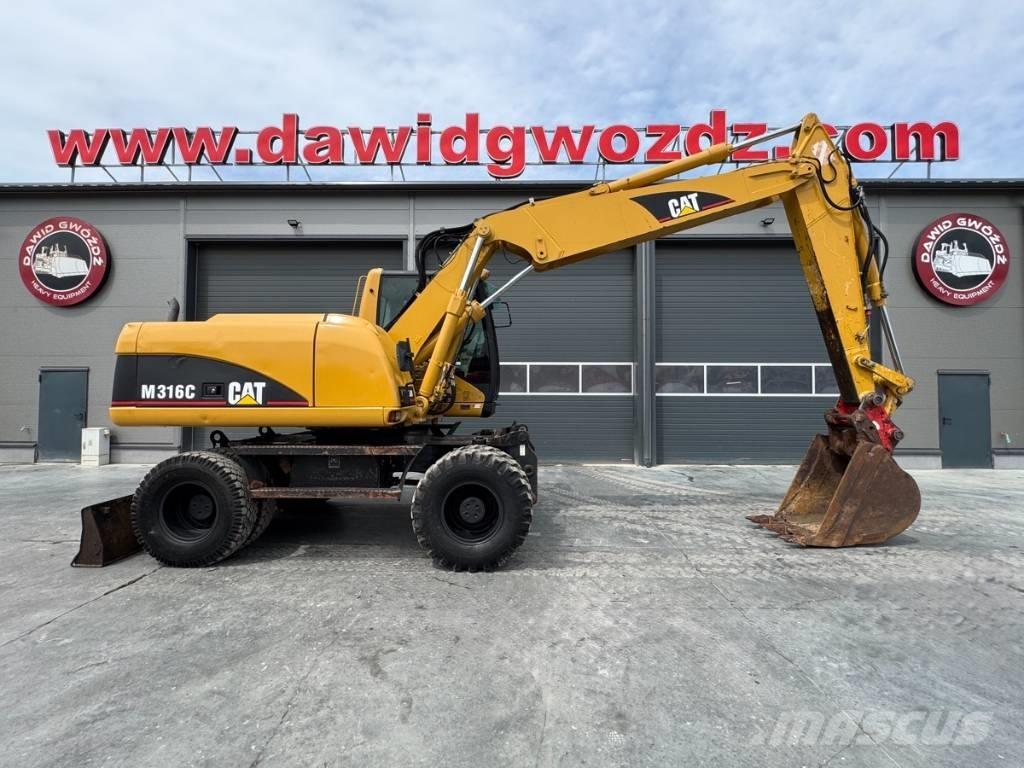CAT M 316 C Ekskavatori uz riteņiem