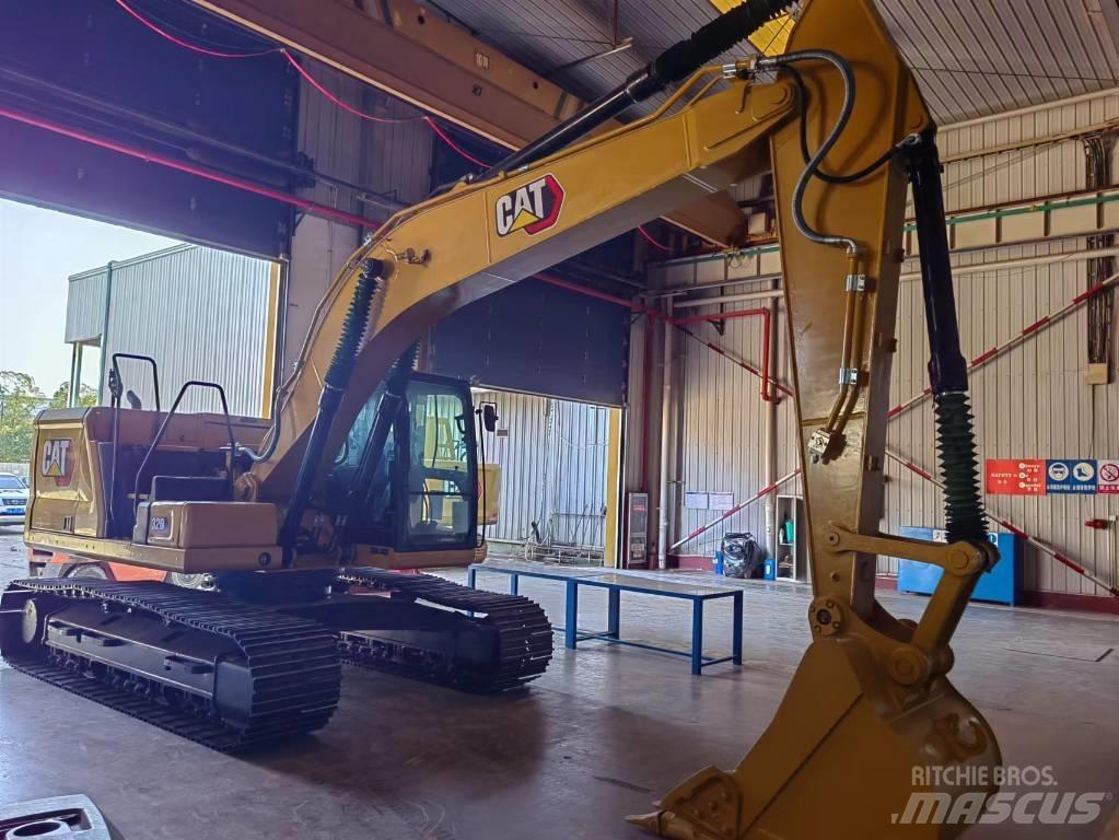 CAT 2021 CAT 320 Ekskavatori uz riteņiem