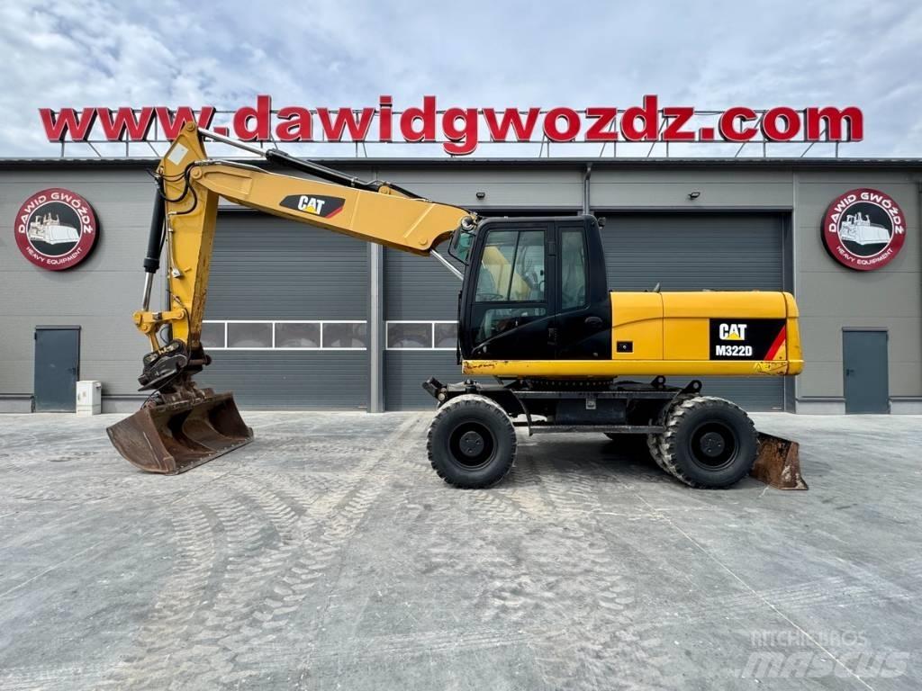 CAT M322D Ekskavatori uz riteņiem